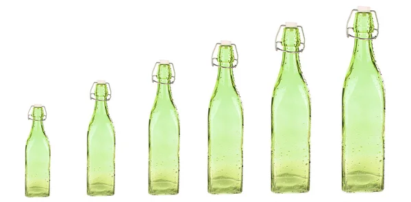 Evolution concept.Colorful bottles isolated on white — Stock Photo, Image