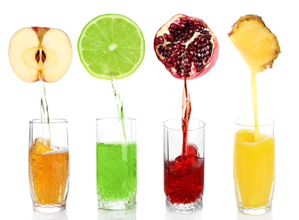 Juice pouring from fruits into glass, isolated on white — Stock Photo, Image
