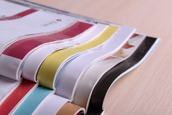 Magazines on wooden table close up — Stock Photo, Image