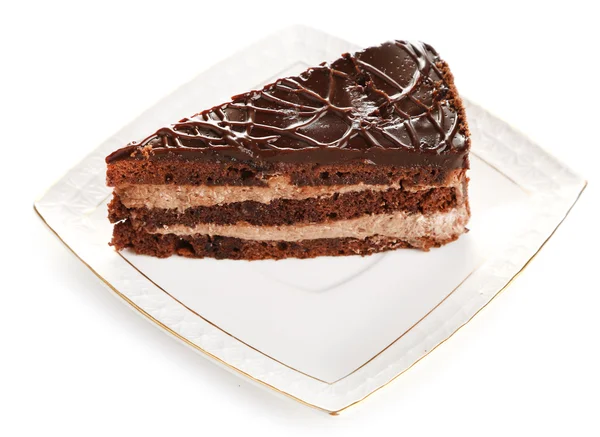 Schokoladenkuchen auf Teller isoliert auf weiß — Stockfoto