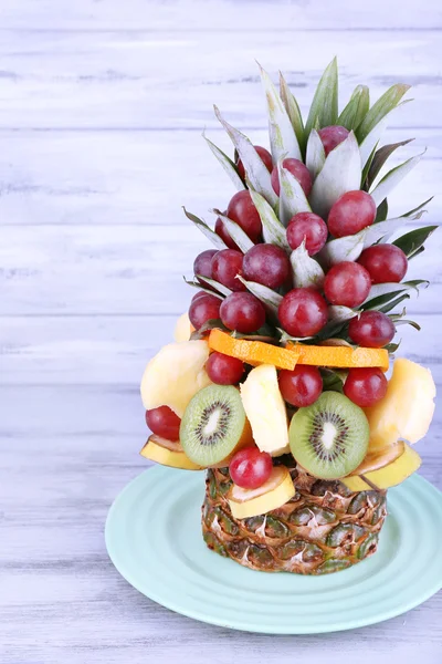 Table decoration made of fruits on grey wooden background — Stock Photo, Image