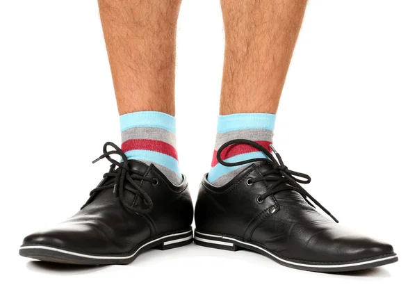 Πόδι άνθρωπος στο κοστούμι και πολύχρωμες κάλτσες, που απομονώνονται σε λευκό — Φωτογραφία Αρχείου