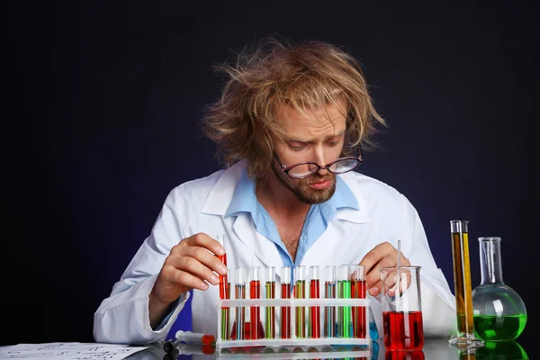 Crazy scientist working in laboratory — Stock Photo, Image