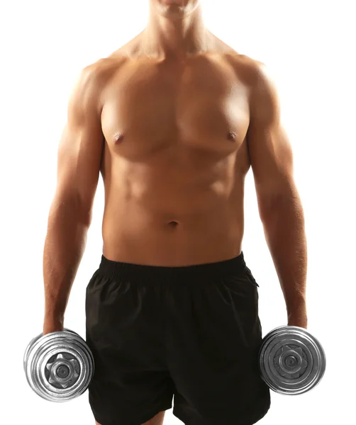 Handsome young muscular sportsman execute exercise with dumbbells isolated on white — Stock Photo, Image