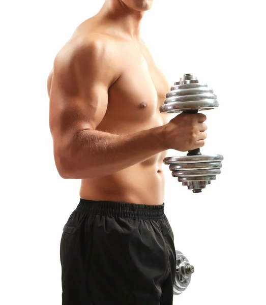 Handsome young muscular sportsman execute exercise with dumbbells isolated on white — Stock Photo, Image