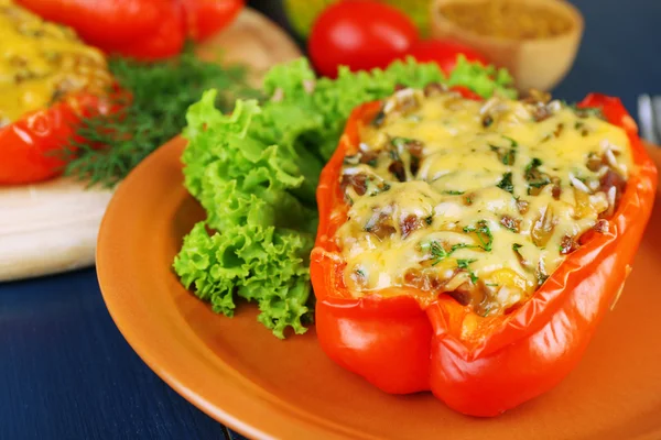 Stuffed red peppers with greens — Stock Photo, Image