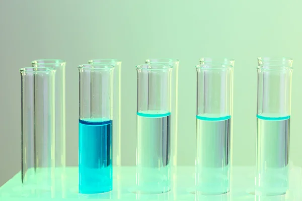 Test-tubes with blue liquid — Stock Photo, Image