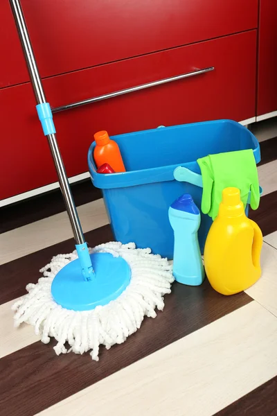 Different tools for cleaning in kitchen — Stock Photo, Image