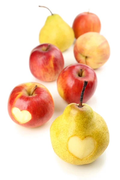 Ripe pear and apple with heart isolated on white — Stock Photo, Image