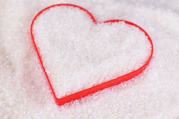 Hjärta täckt i vitt socker, närbild — Stockfoto