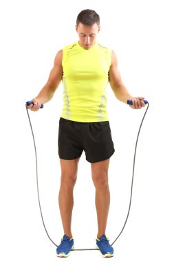 yakışıklı genç sporcunun üzerinde beyaz izole ipi tutan