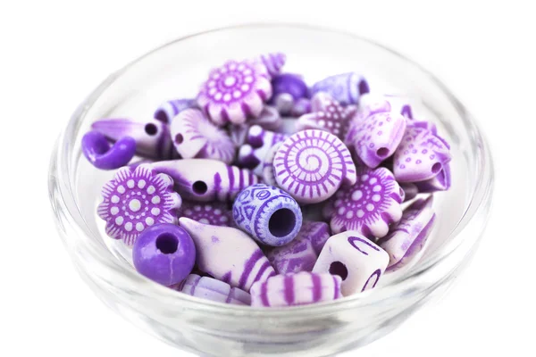 Beads in glass bowl — Stock Photo, Image