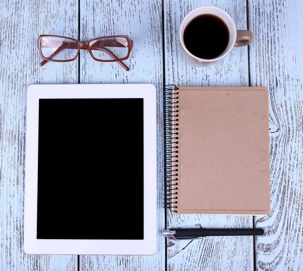 Tablet, mug of coffee, notebook — Stock Photo, Image