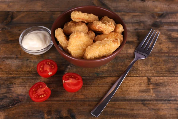 Chicken nuggets with sauce on table close-up — Stock Photo, Image