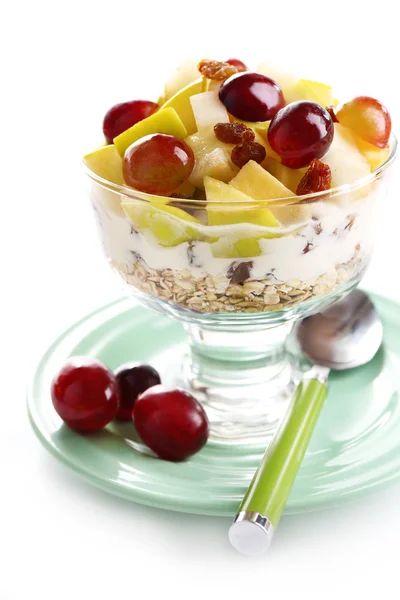 Healthy breakfast - yogurt with  fresh grape and apple slices and muesli served in glass bowl, isolated on white — Stock Photo, Image