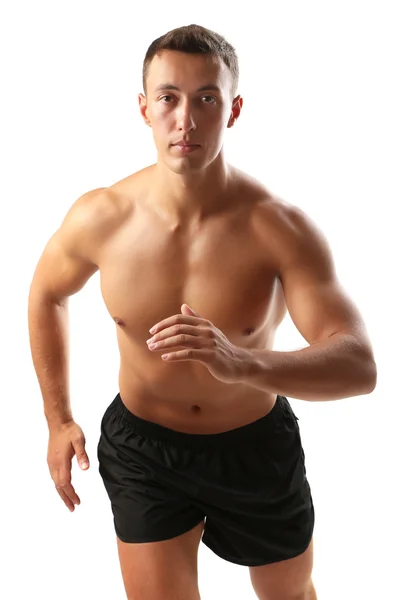 Schöner muskulöser junger Mann isoliert auf weiß — Stockfoto