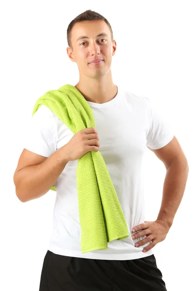 Bonito jovem desportista segurando toalha isolada no branco — Fotografia de Stock