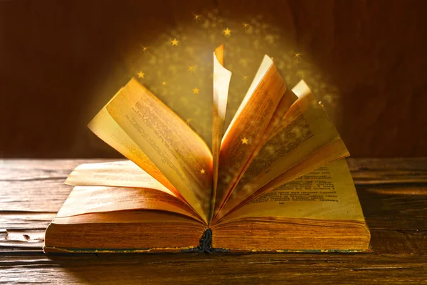 Magical book on bright background — Stock Photo, Image