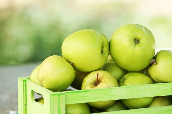 Juicy apples in boxes — Stock Photo, Image