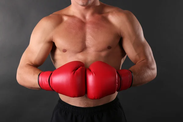A boksz-kesztyűket sportember — Stock Fotó