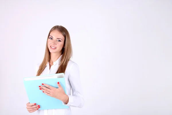 Business woman holding folder, isolated on white — Stock Photo, Image