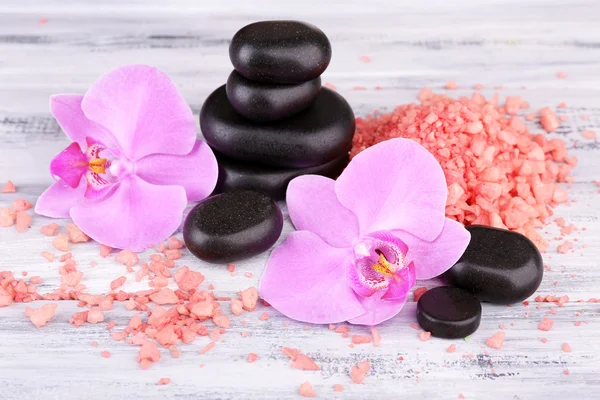 Orchid flowers and spa stones — Stock Photo, Image