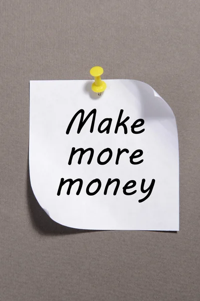 Paper sheet with inscription "Make more money" on grey background — Stock Photo, Image