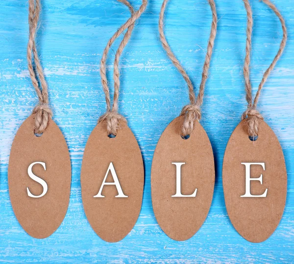 Sale tags on wood — Stock Photo, Image