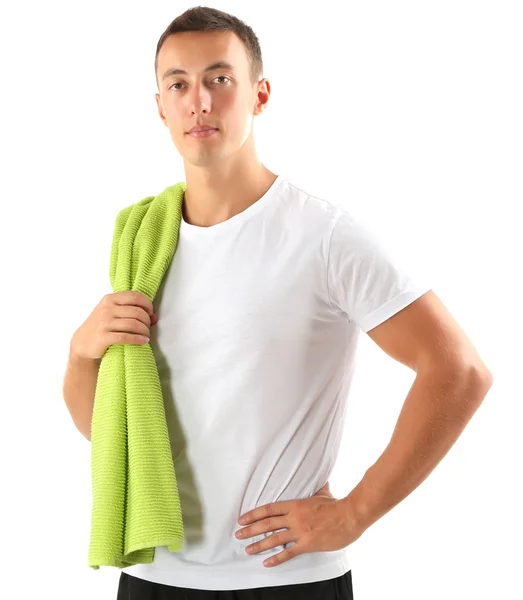 Handsome young sportsman holding towel isolated on white — Stock Photo, Image