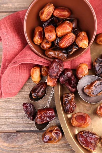 Tasty dates fruits on wooden background — Stock Photo, Image