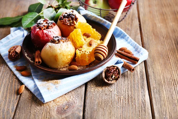 Baked apples on plate