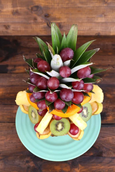 Table decoration made of fruits on brown wooden background — Stock Photo, Image