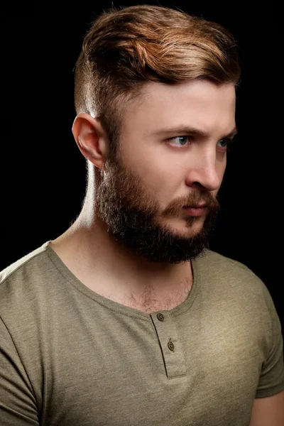 Portrait of handsome man with beard on black background — Stock Photo, Image