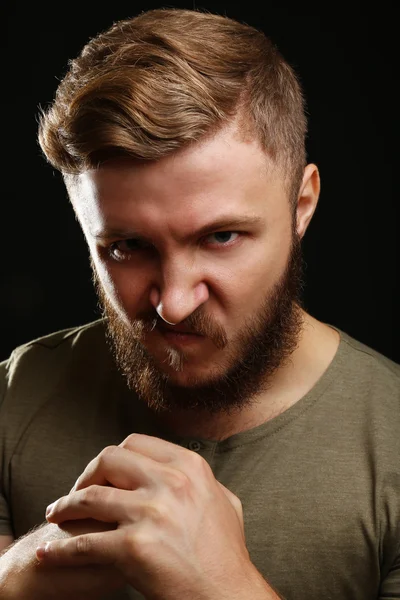 Portrait of handsome man with beard on black background — Stock Photo, Image