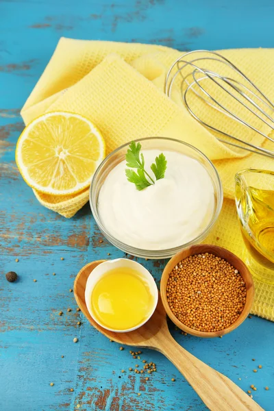 Mayonnaise ingredients on wooden background — Stock Photo, Image