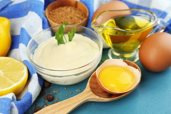 Mayonnaise ingredients on wooden background — Stock Photo, Image