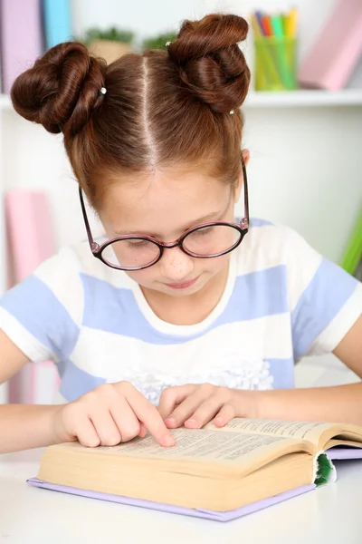 Cute girl at workplace in classroom — Stock Photo, Image