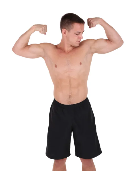 Bello muscolare giovane uomo isolato su bianco — Foto Stock