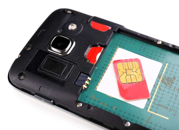 Sim card and smart phone — Stock Photo, Image