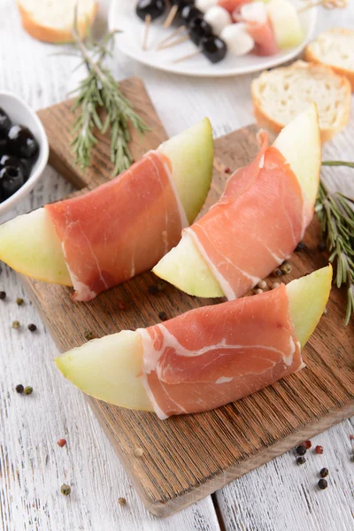 Melon with prosciutto — Stock Photo, Image