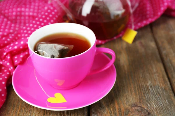 Teapot and tea bags — Stock Photo, Image