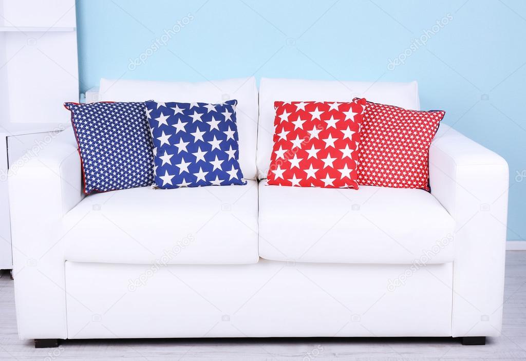 White sofa with pillows