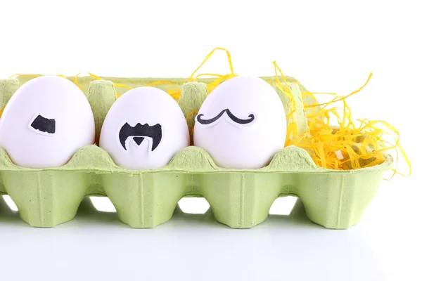 Ägg i ägg facket isolerad på vit — Stockfoto