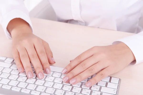 Hands typing on keyboard — Stock Photo, Image