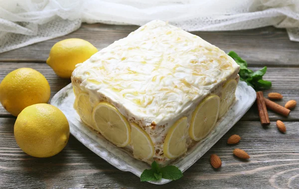 Tasty lemon cake on table at home — Stock Photo, Image