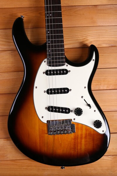 Electric Guitar on wooden background