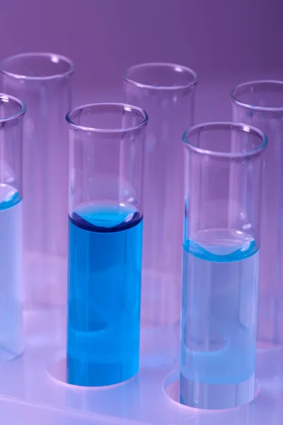 Test-tubes with blue liquid — Stock Photo, Image