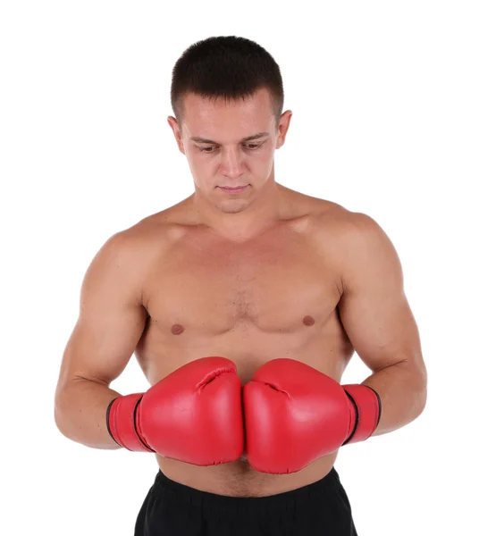 Bonito jovem desportista muscular com luvas de boxe isolado em branco — Fotografia de Stock