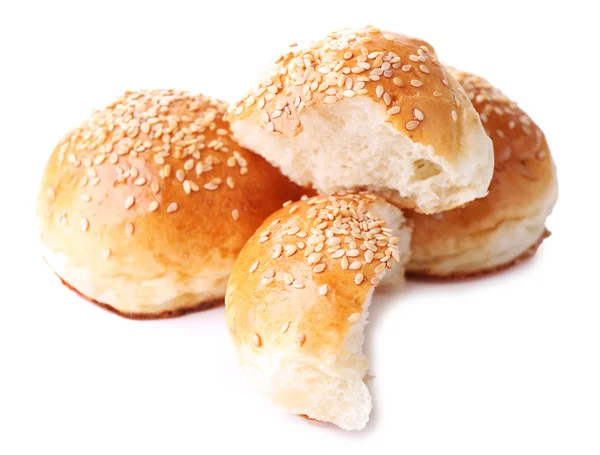 Tasty buns with sesame isolated on white — Stock Photo, Image