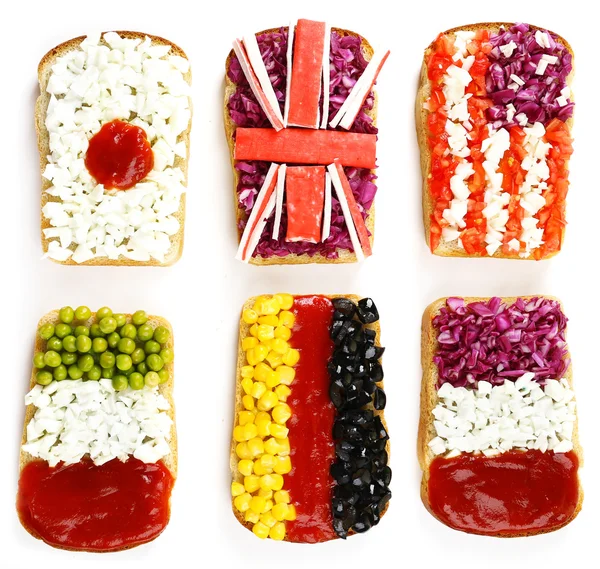 Smörgåsar med olika flaggor — Stockfoto